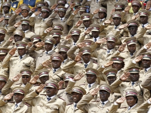 Members of Kenya's provincial administration salute during Mashujaa Day celebrations at the Nyayo National Stadium in Nairobi
